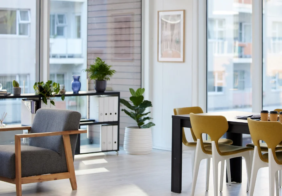 Clean and modern office with gray and yellow chairs